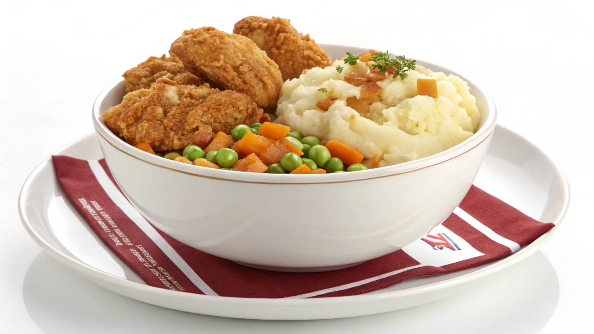 Homemade KFC Bowl with crispy chicken, mashed potatoes, corn, and gravy
